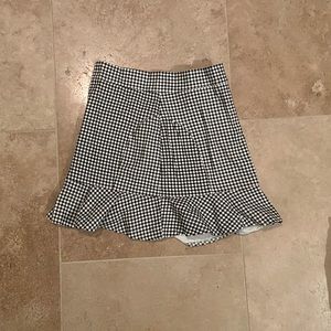 Black and white checkered skirt
